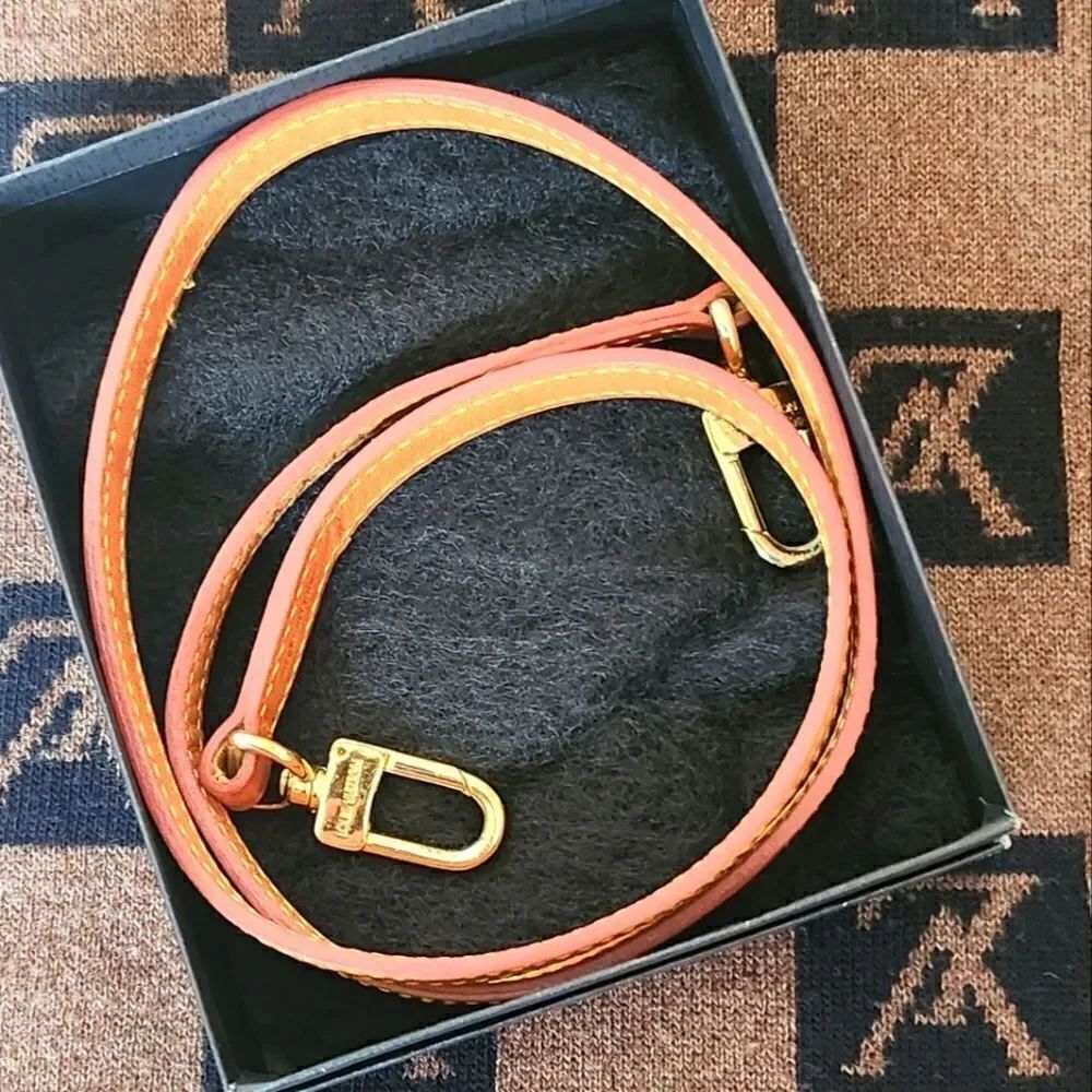 Louis Vuitton Leather with Goldtone Brass Strap